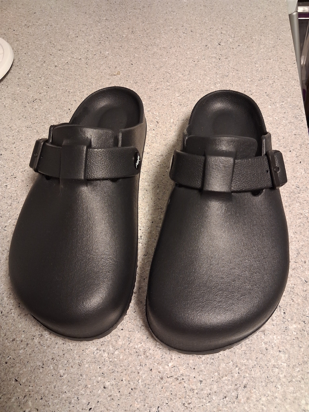 Black Slip-On Clogs with Adjustable Strap